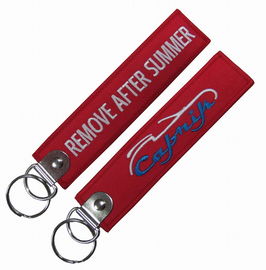 Tag  Delicate Embroidered Remove Before Flight Keychain
