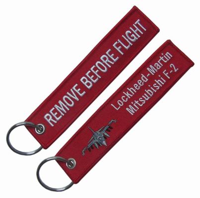 75% Embroidery Remove Before Flight Keychain PMS Merrow Broders